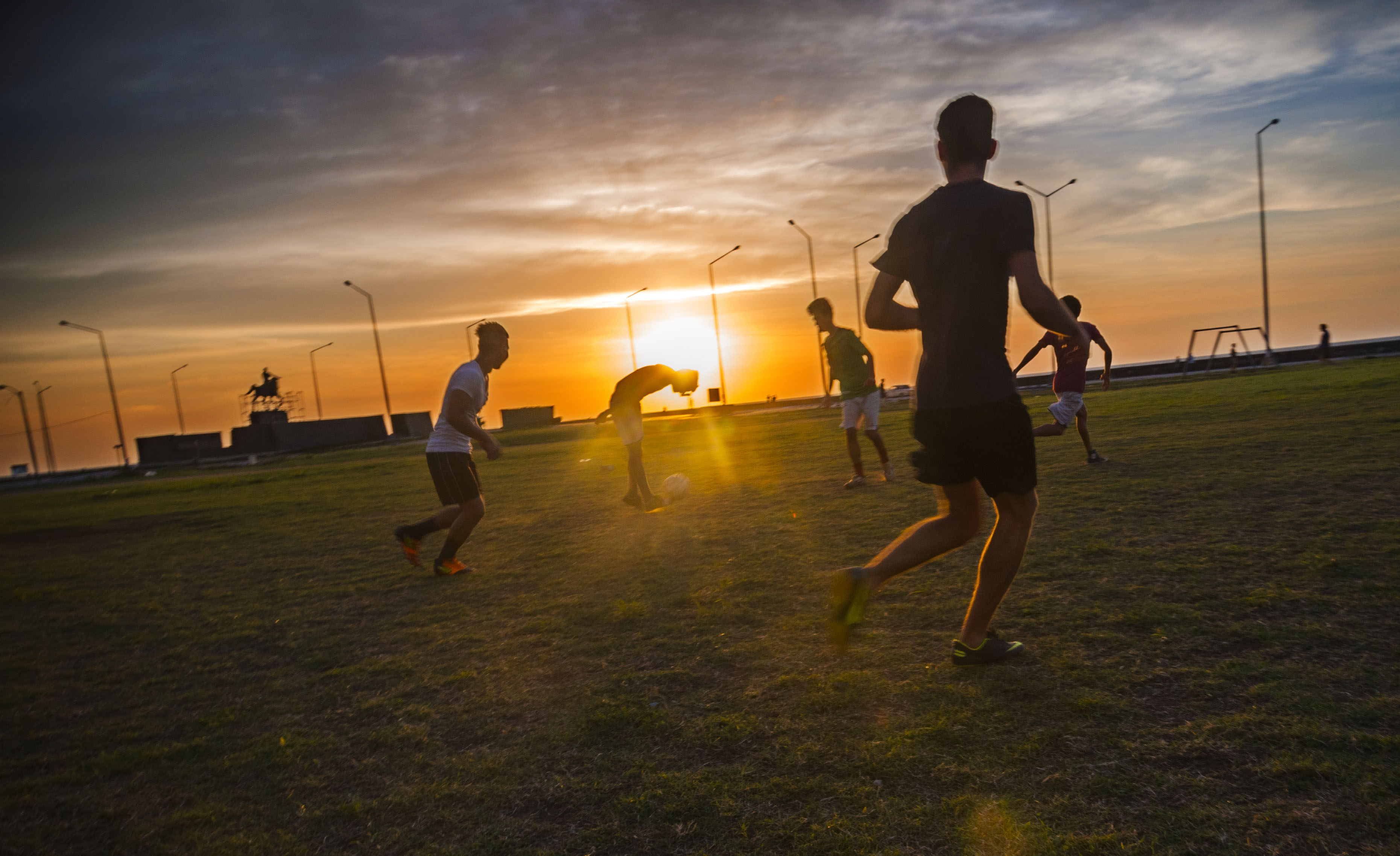 Boys playing soccer in Cuba